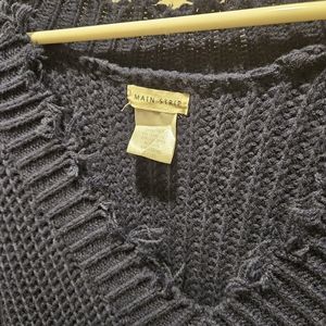 Low cut v-neck distressed sweater